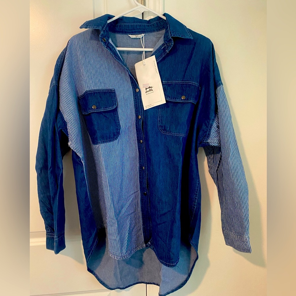 Super cool asymmetrical design denim button down shirt. UNISEX